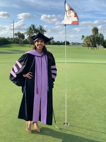 Aliza Hanif golfing