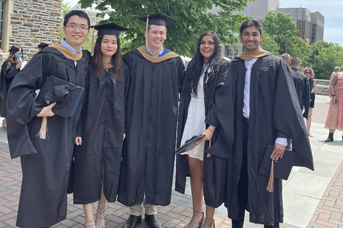 Photo of Fuqua MQMBA students at graduation