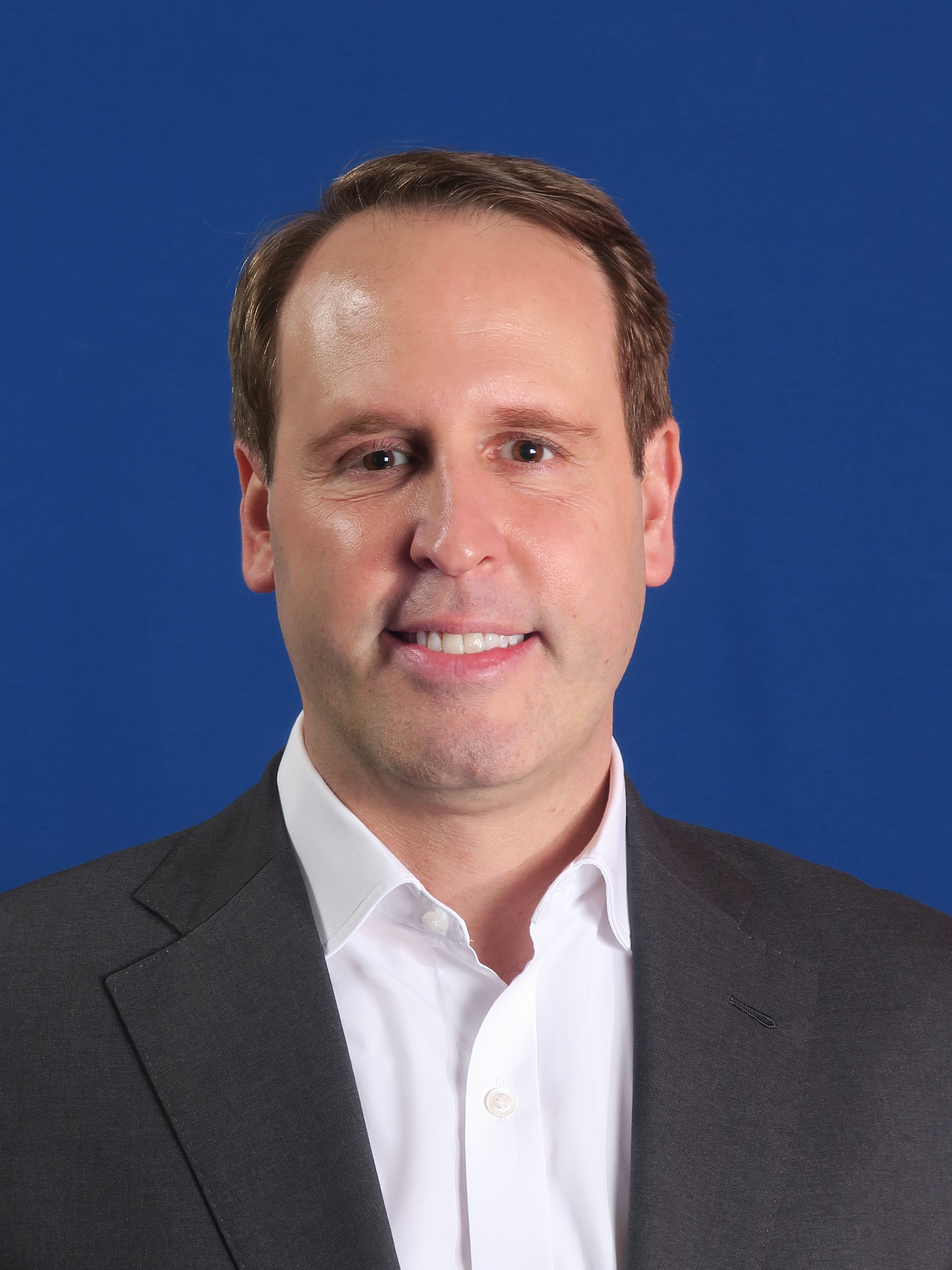 A headshot photo of Brandt