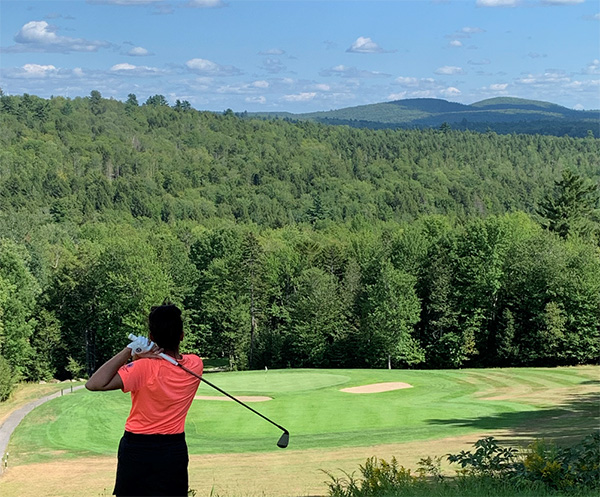 Aliza Hanif golfing