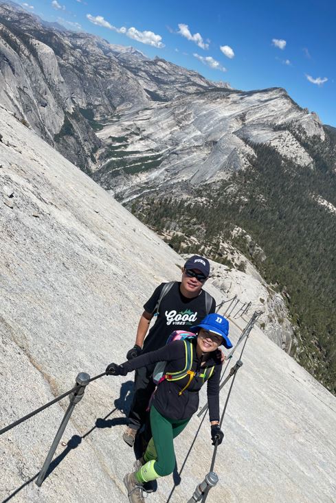 Jia on a hike in the mountains with his wife, Tracey