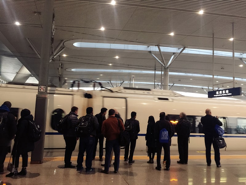 Fuqua GEMBA students waiting to board the high speed train in Shanghai
